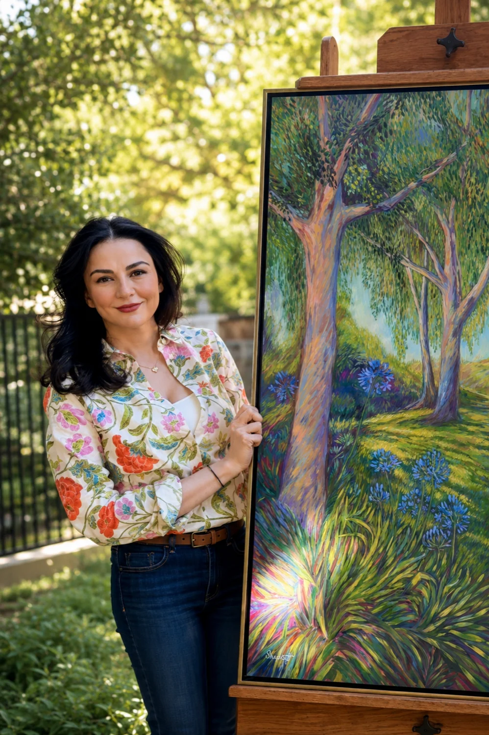 Sofia Sharbat with her painting Summer Jewels